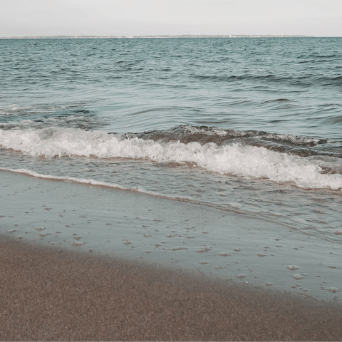 Spend the day on sandy Glyfada Beach, 1 kilometre away