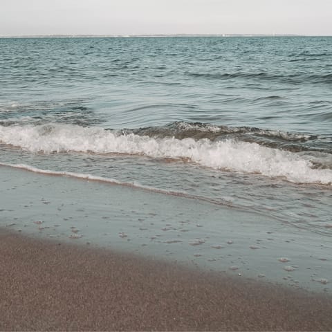 Spend the day on sandy Glyfada Beach, 1 kilometre away