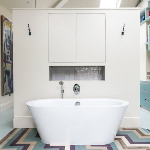 Treat yourself to an indulgent soak in the freestanding bathtub