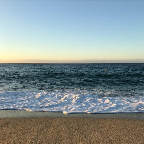 Spend a day on the coast at Es Grau beach, 5km away