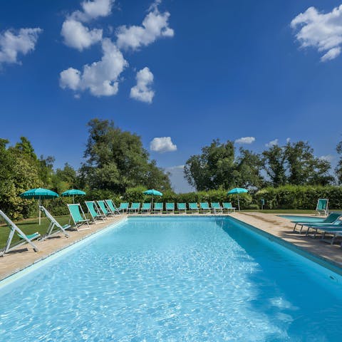 Dive into the communal pool to beat the Italian heat