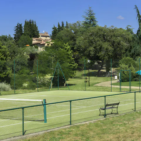 Play a game of tennis on the shared court