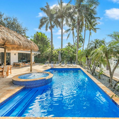 Savour slow afternoons relaxing by the private pool