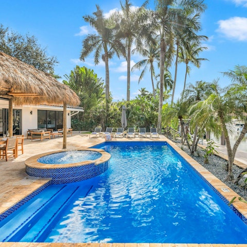 Savour slow afternoons relaxing by the private pool