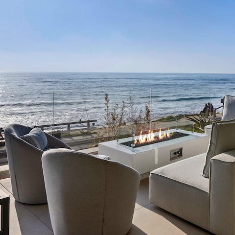 Spend your evenings watching the sun set over the ocean