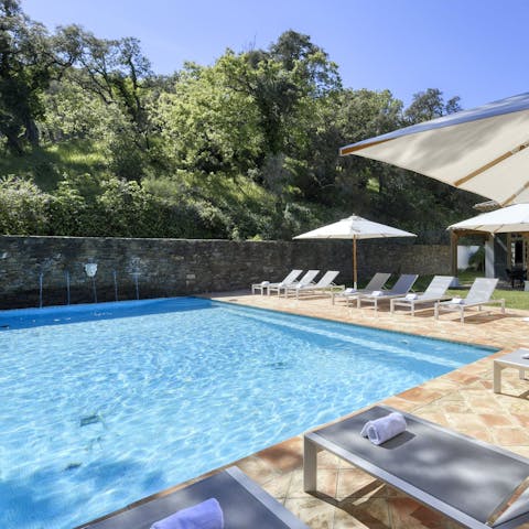 Spend a lazy afternoon lounging by the private pool