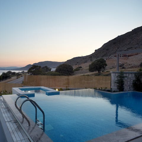 Take a twilight dip with the Mediterranean Sea as your backdrop