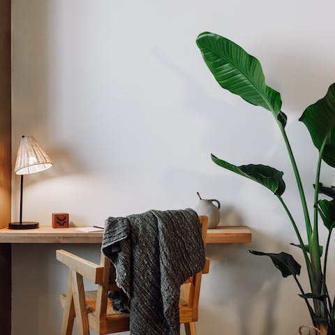 Work from home at the dedicated desk if you're in town on business
