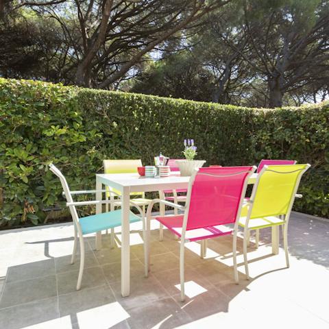 Organise an alfresco feast on the home's garden furniture