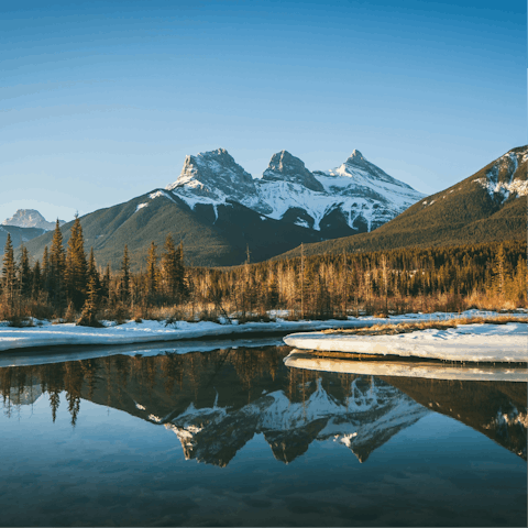 Explore Canmore and its Three Sisters Peaks