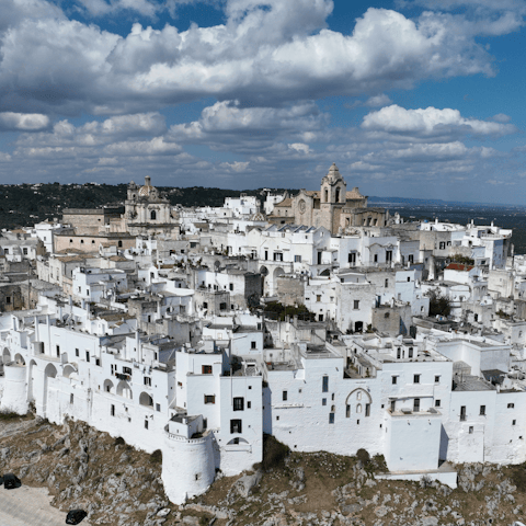 Visit Ostuni, only a fifteen-minute car ride away