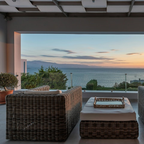 Sip sunset cocktails while admiring sea views