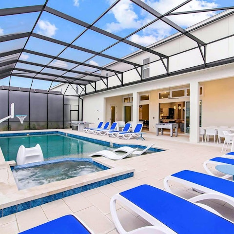 Soak up the Florida sun from the screened private pool