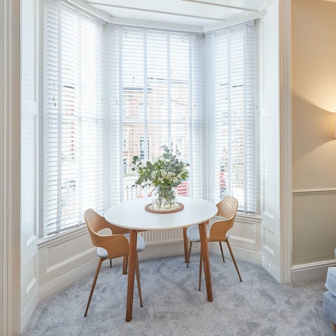 Watch the world pass by as you tuck into fish and chips