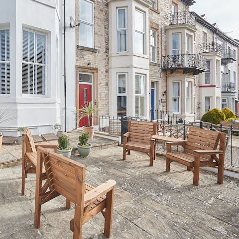 Enjoy your morning cuppa in the shared patio garden