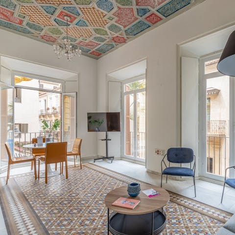 Peer out onto Malaga's streets from the Juliet balconies with morning coffees