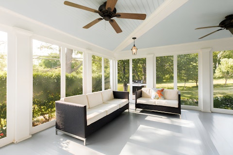 Gather in the sunroom to sip pre-dinner cocktails