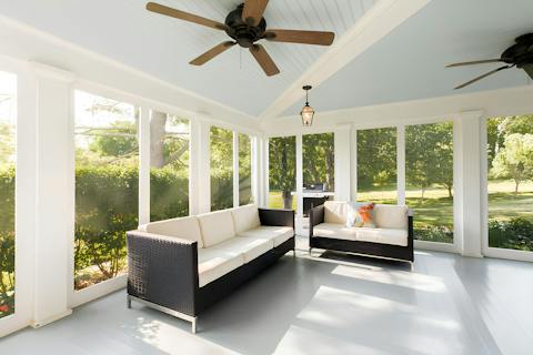 Gather in the sunroom to sip pre-dinner cocktails