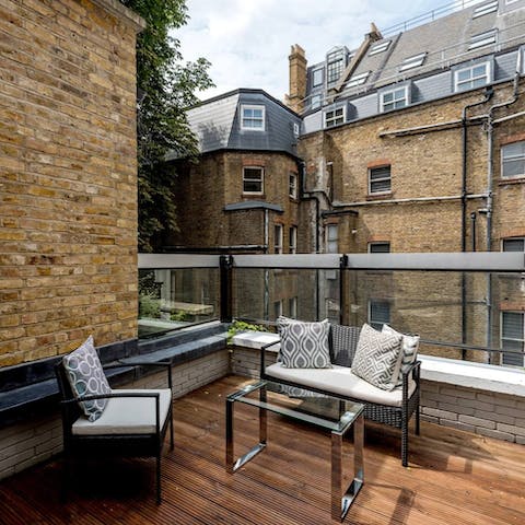 Sip bubbly on the decked balcony