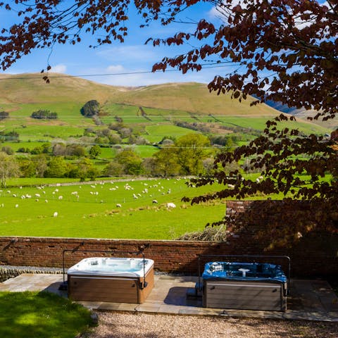 Fire up the two hot tubs for sundowners with a view