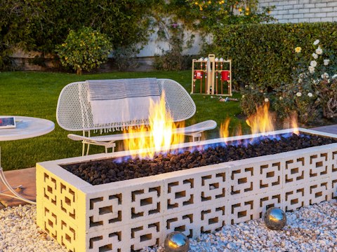 Toast the evening around the fire pit under the desert sky