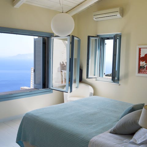 Watch the waves roll in from the comfort of your bed