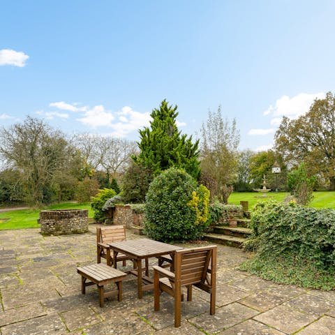 Enjoy an alfresco coffee overlooking the landscaped garden