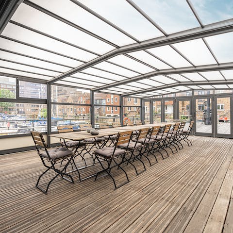 Host an extravagant meal in the glasshouse on the upper deck