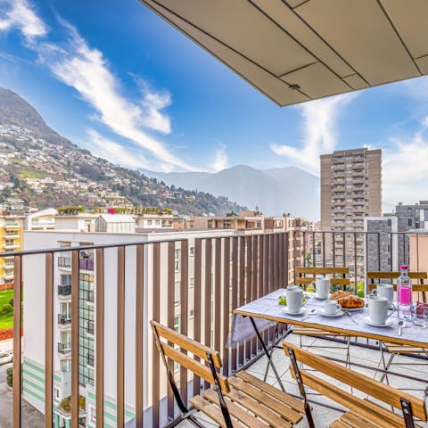 Dine on fresh swiss pastries while gazing at mountain views from the balcony