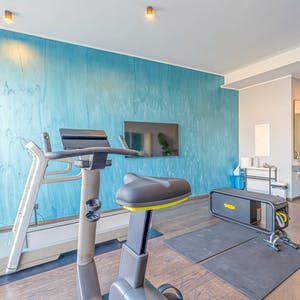 Warm up your muscles in the communal gym before heading out on a hike