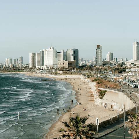 Head down to Tel Aviv Beach, just ten minutes away by foot