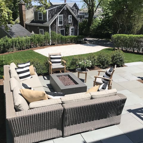 Gather around the fire pit on long warm evenings