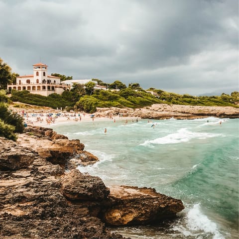 Take a trip to Port d'Alcúdia and spend a sunny day on the beach