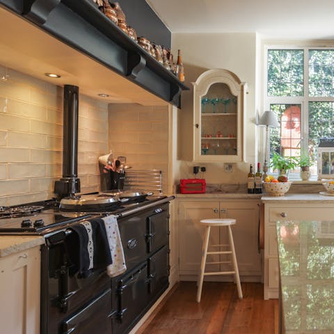 Cook farmhouse-style on the huge Aga in the kitchen