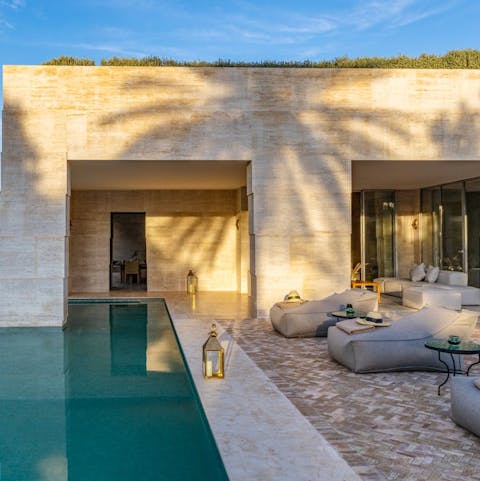Stretch out in pure harmony next to the private pool