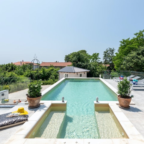 Float the day away in the swimming pool