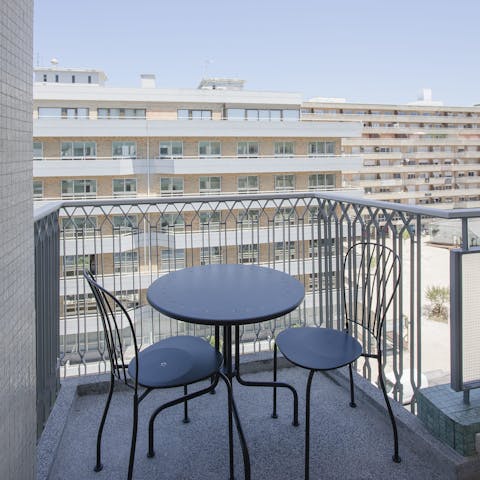Catch some fresh air on the private balcony