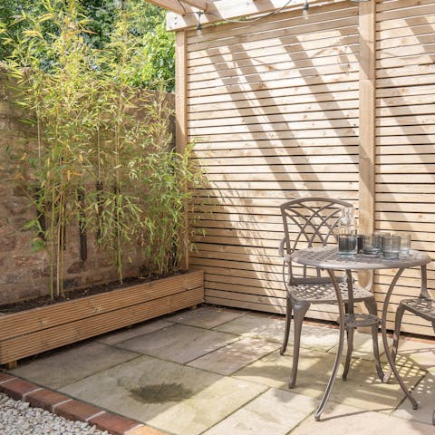 Take your evening drinks outside to the serene courtyard