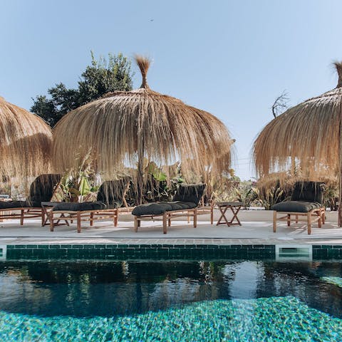 Spend hot afternoons swimming in the pool or relaxing on a lounger