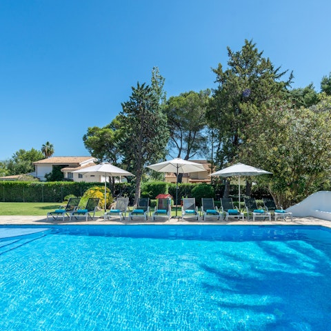 Spend blissful days relaxing by the pool