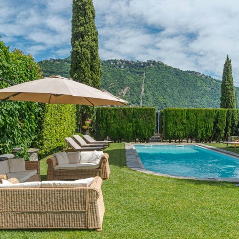 Swim, splash, and sunbathe in the pool and garden