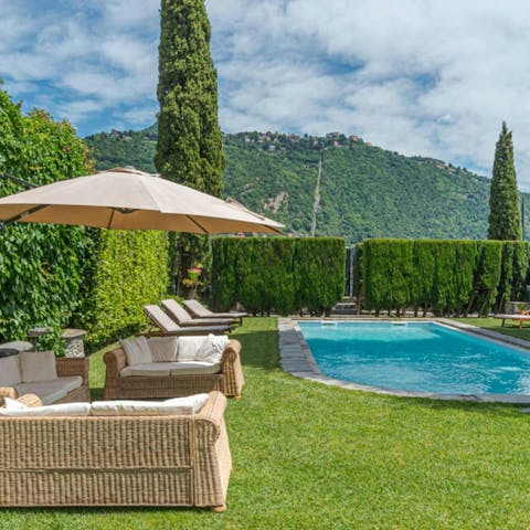 Swim, splash, and sunbathe in the pool and garden