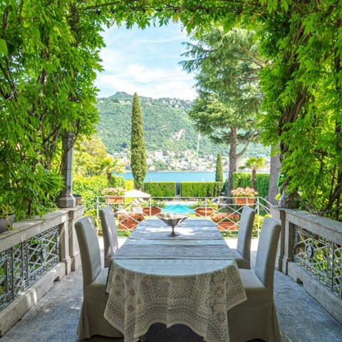 Dine alfresco on the shaded terrace with lake views