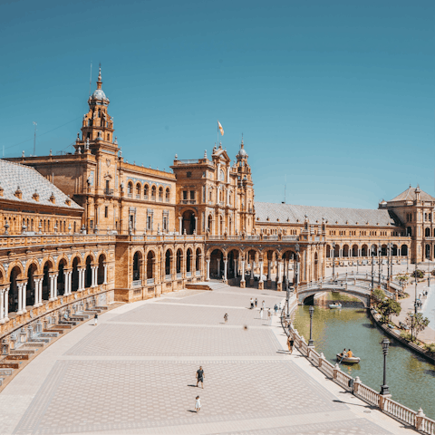 Let the sun warm your skin as you stroll along the Plaza de España