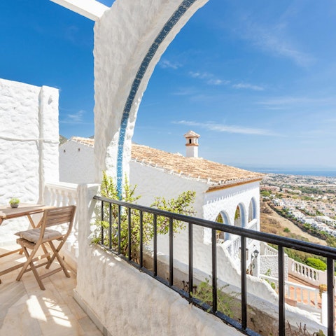 Start your day with coffee on the balcony overlooking the village below