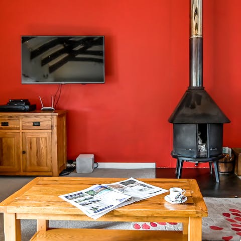 Cosy up around the wood burner – you're welcome to use logs from the owner's wood store