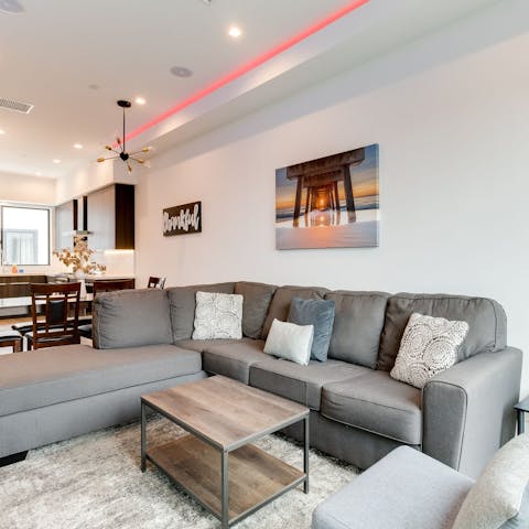 Kick back and relax on the comfy L-shaped couch