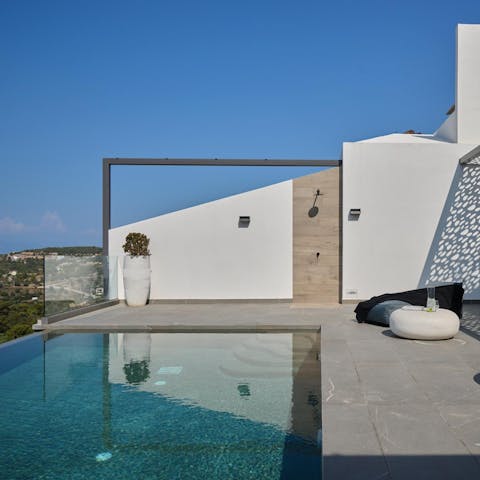 Enjoy sunshine and scenic views from the swimming pool