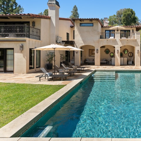 Lounge by the pool in between refreshing dips, or soak in the hot tub as the sun sets