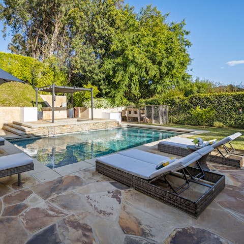 Lounge by the pool in between refreshing dips, or soak in the hot tub as the sun sets